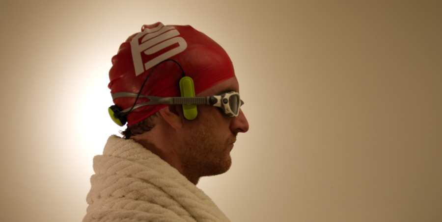 The Platysens Marlin Swim Meter being worn on a swimmer's head