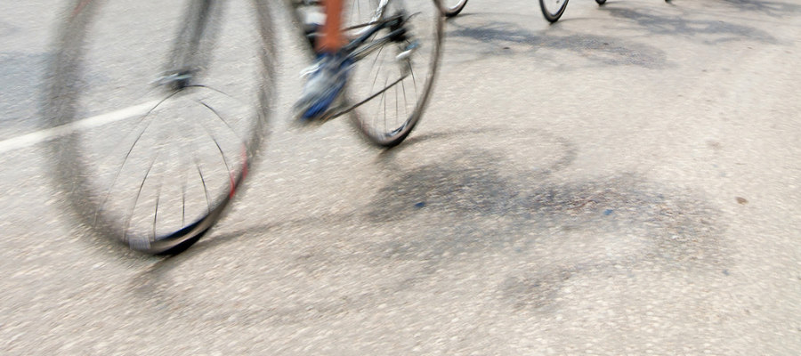 A road bike riding on the road