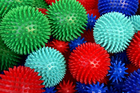 A photograph of various colored spiky massage balls