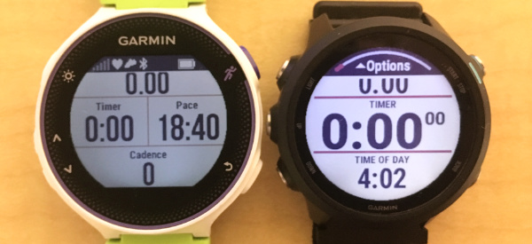 A close-up photo of the Garmin Forerunner 230 next to the Forerunner 245 running watch